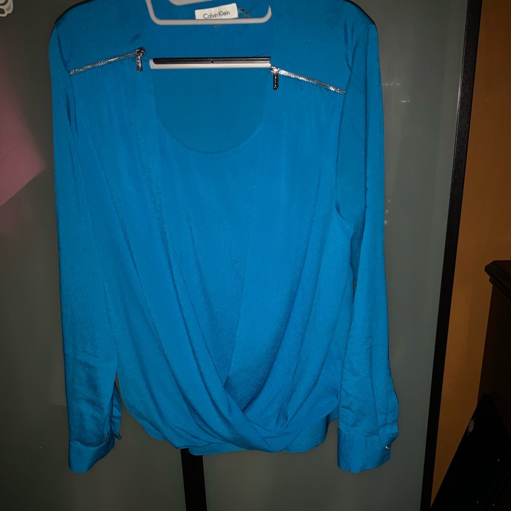 Simple blue Calvin Klein blouse with zipper acc
